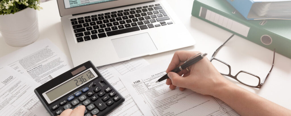 photo of person doing taxes