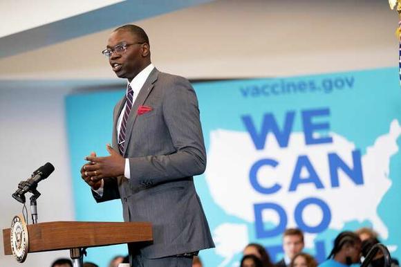 man speaking at a Bring Michigan Together event